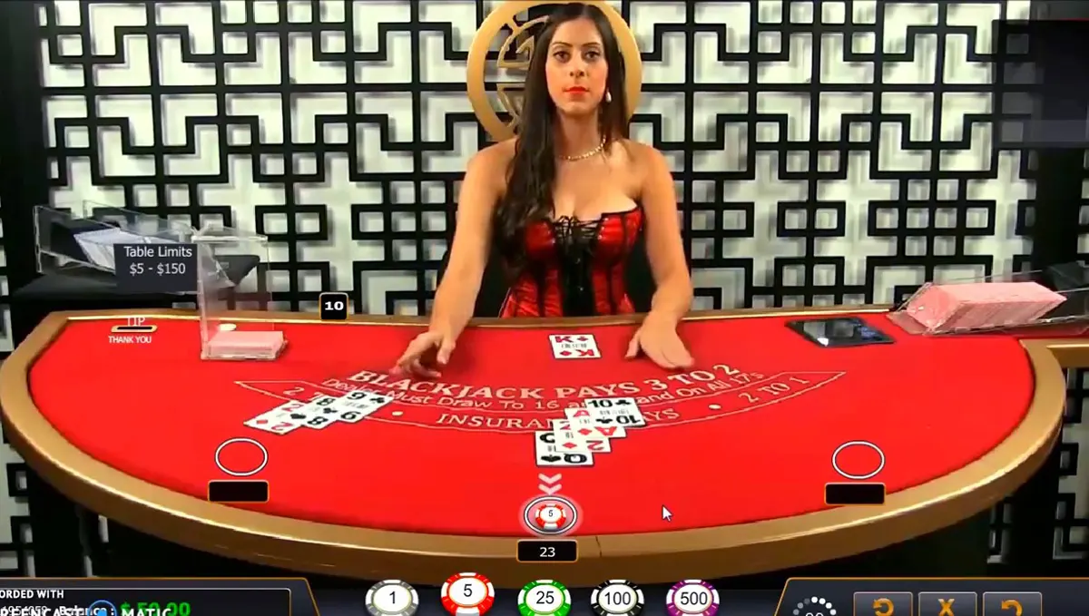 Live online blackjack table with a female dealer in a red outfit behind a bright red felt, visible card hands and betting chips on the interface, plus table limits and card shoe on the side against a patterned backdrop.